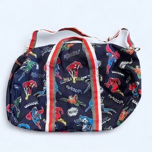 Pottery Barn Kids DC Comics navy duffle bag embroidered with “MAXWELL”